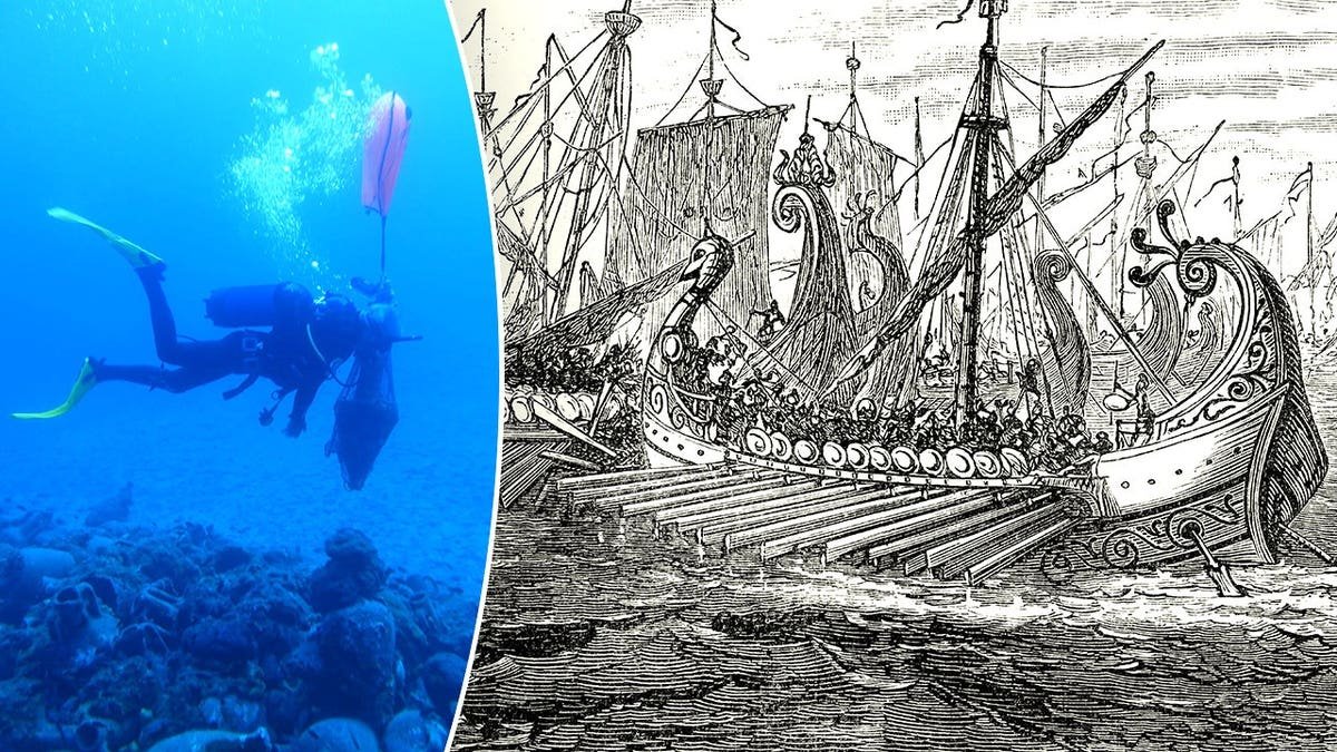 View of diver next to depiction of ancient ship