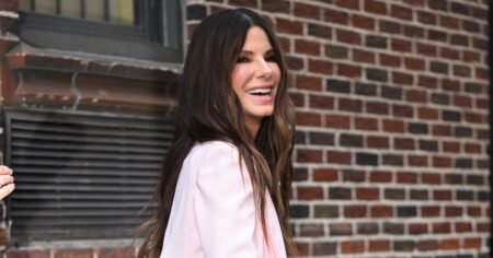 Sandra Bullock’s Slouchy Knit Is the Perfect Rich-Mom Layer for Summer-to-Fall Weather