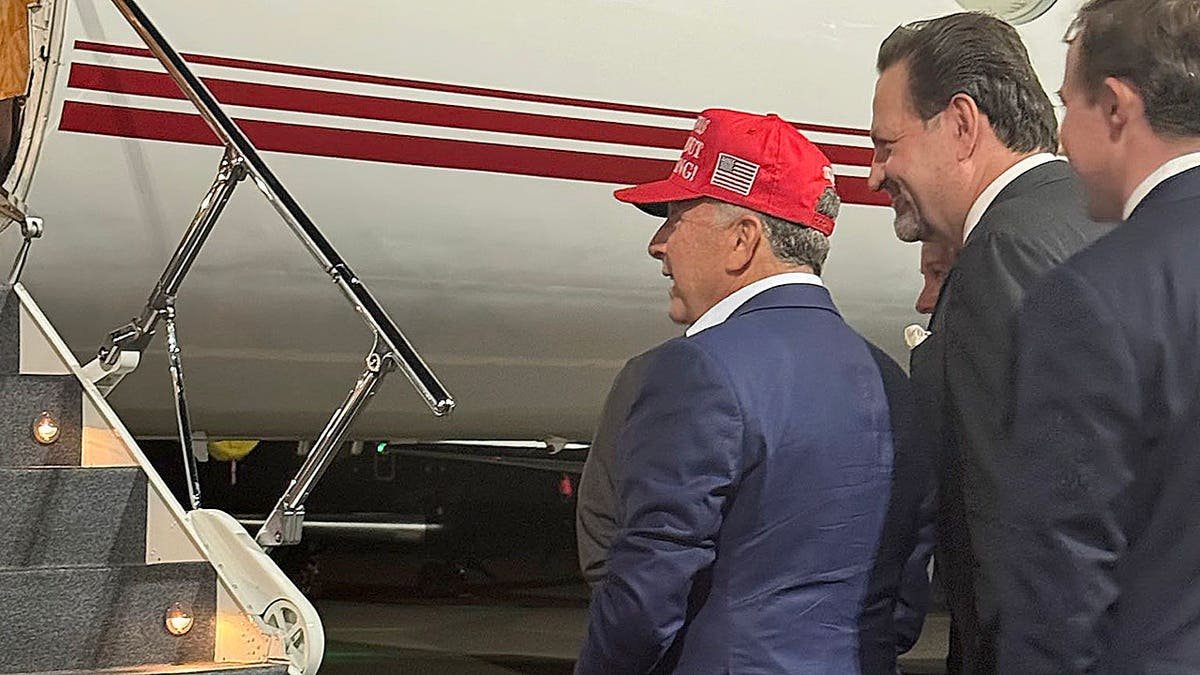 Sebastian Gorka and Steve Witkoff on airport tarmac