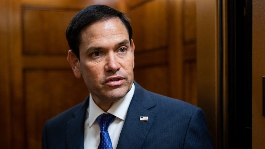 Marco Rubio talks to reporters