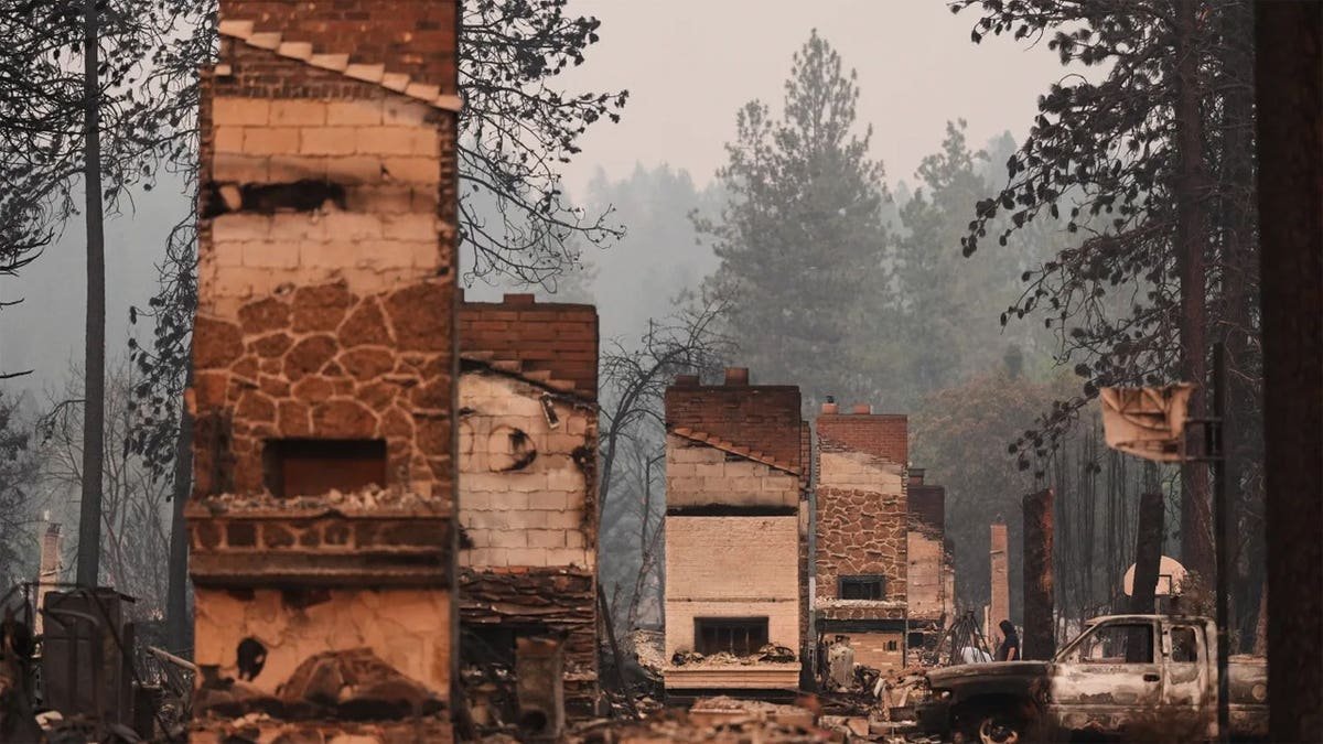 Chimneys remaining after wildfire in Spokane, Washington
