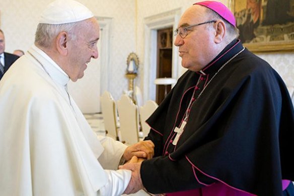 Christopher Saunders with Pope Francis prior to his resignation.