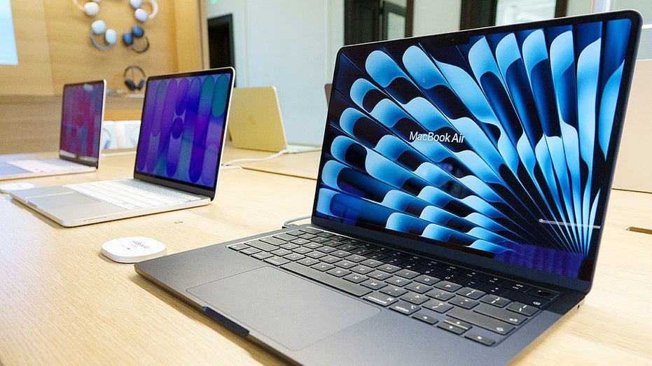 Apple MacBooks lined up