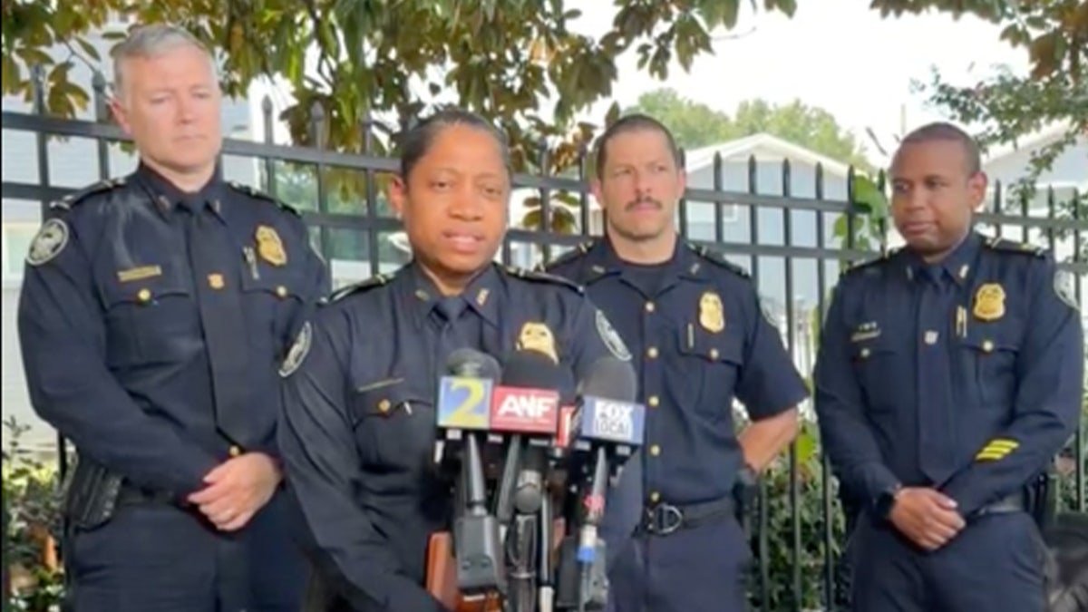 Atlanta police officers holding a press conference.