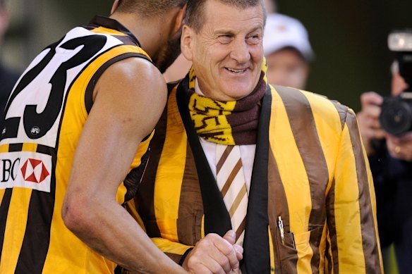 Jeff Kennett celebrates a Hawks win with Lance Franklin in 2011.