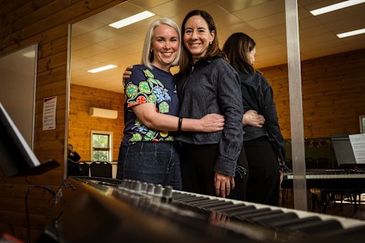 Friends for life: Sascha Davis (left) and Kate Howard at the Australian Children’s Choir alumni choir rehearsal in Mount Evelyn on Saturday.