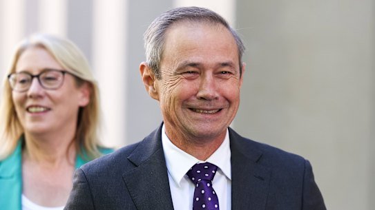 West Australian Premier Roger Cook and Rita Saffioti in Canberra - happy with a GST system that delivers WA an extra $6 billion a year.