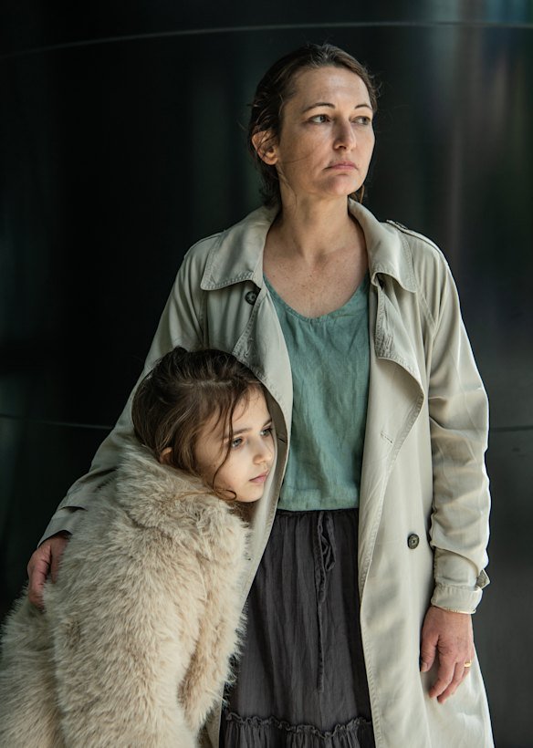 Gillian Hallac, pictured with daughter Amelia, 8, believes her mother was taken from her home.
