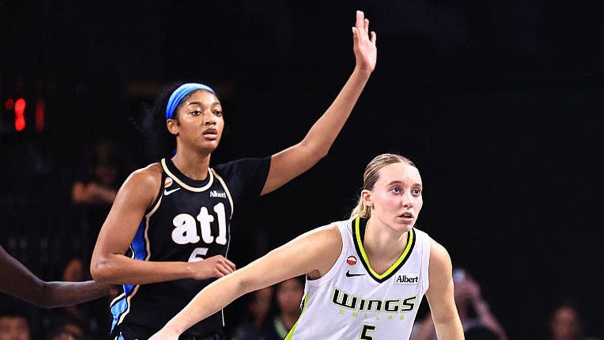 Paige Bueckers #5 of the Dallas Wings plays defense on Angel Reese #5 of the Atlanta Dream