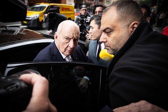 The former broadcaster arrived looking every centimetre like a man arriving for his day in court.