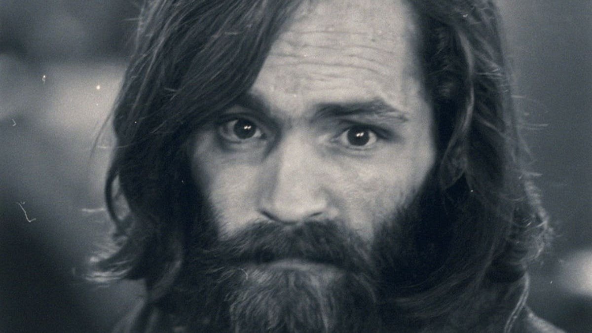 Charles Manson in a portrait photograph.