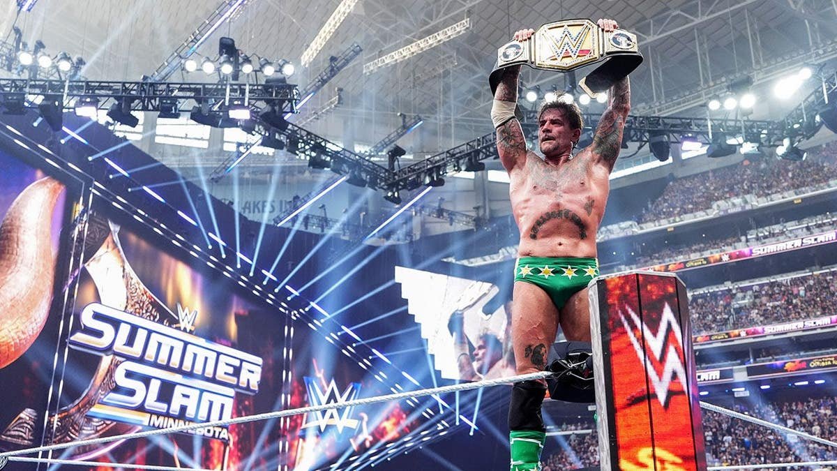 CM Punk celebrates his win at U.S. Bank Stadium.