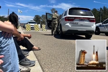 Reporters face guns and sirens after arriving for California Vandenberg Space Force event