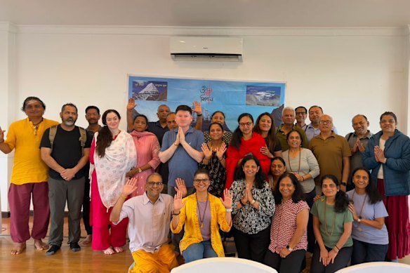 A group of 26 pilgrims to Mount Kailash in Tibet, including seven Australians, was spared being in the flash flooding zone because the flight to take them there was overbooked.