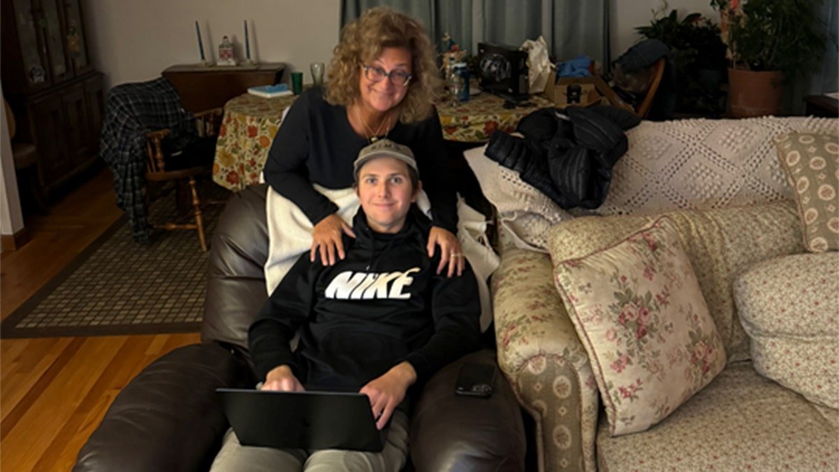 Eric Tarpinian-Jachym pictured with his mother
