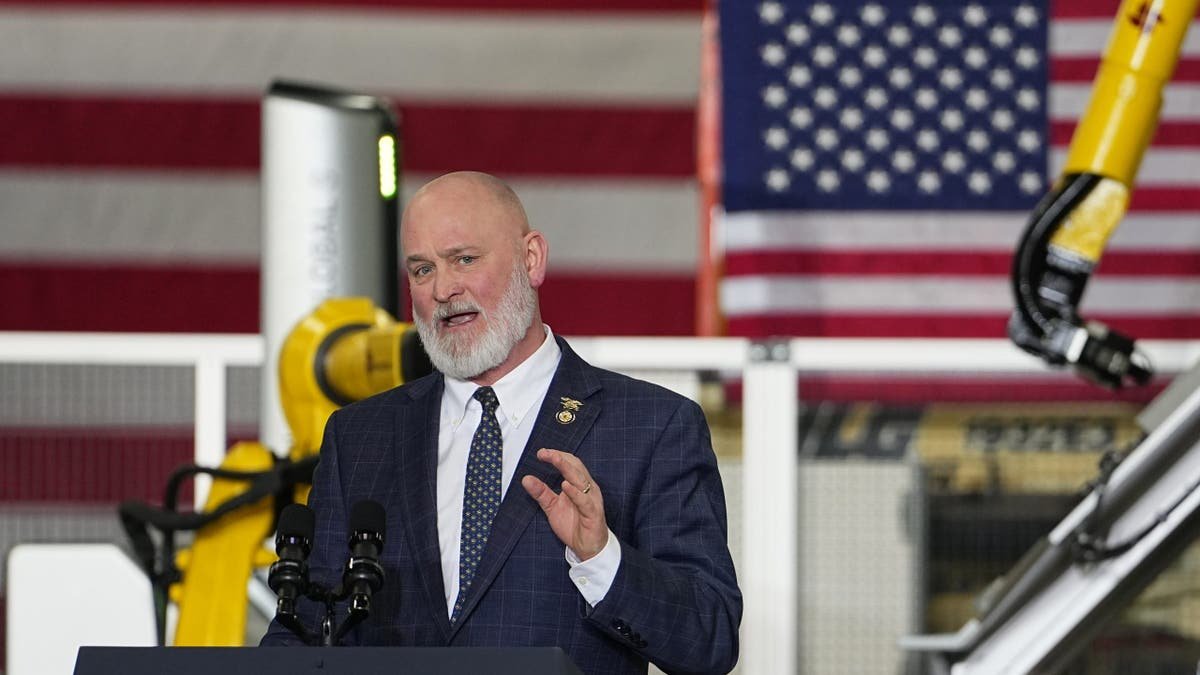 Rep. Derrick Van Orden speaks before Vice President JD Vance at Pointe Precision in Plover, Wisconsin.