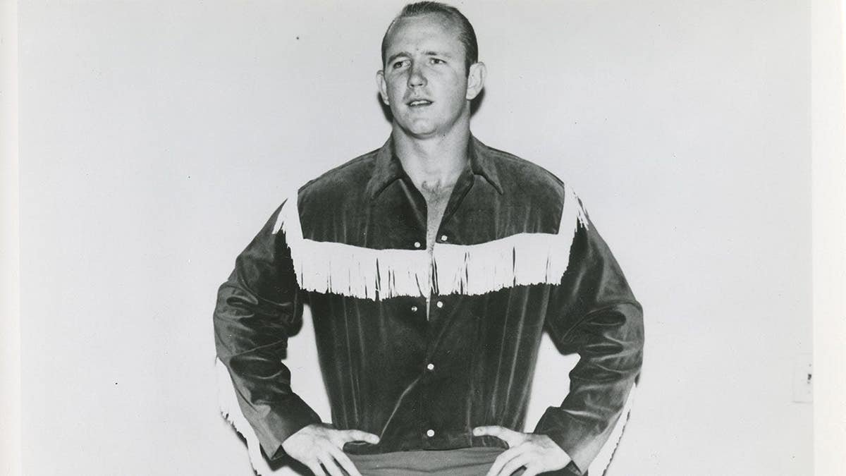 Dory Funk Jr. poses for photos against a plain background.