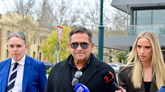 Nicky Wimnar, centre, has been found guilty of assault. He is being represented by Dermot Dann, left.
