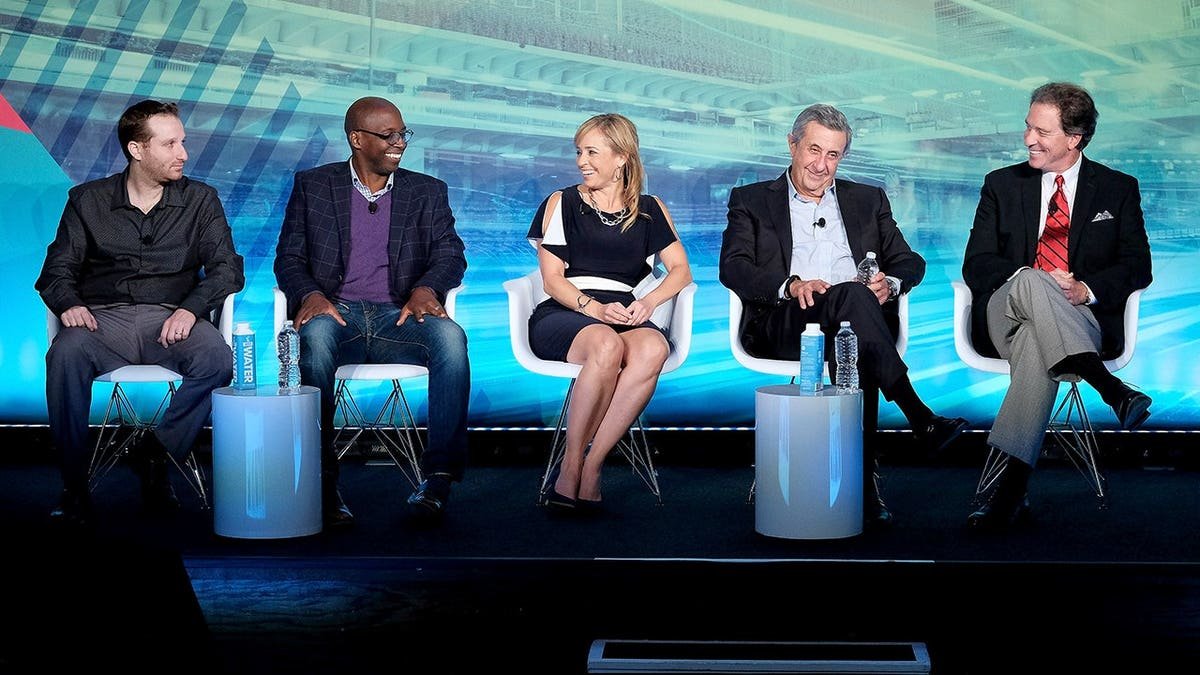 Michael Holley speaks onstage with other sports broadcasters at a panel during Advertising Week New York.