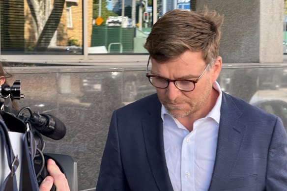 Christopher James McCann leaving the Brisbane Watch House last year. 