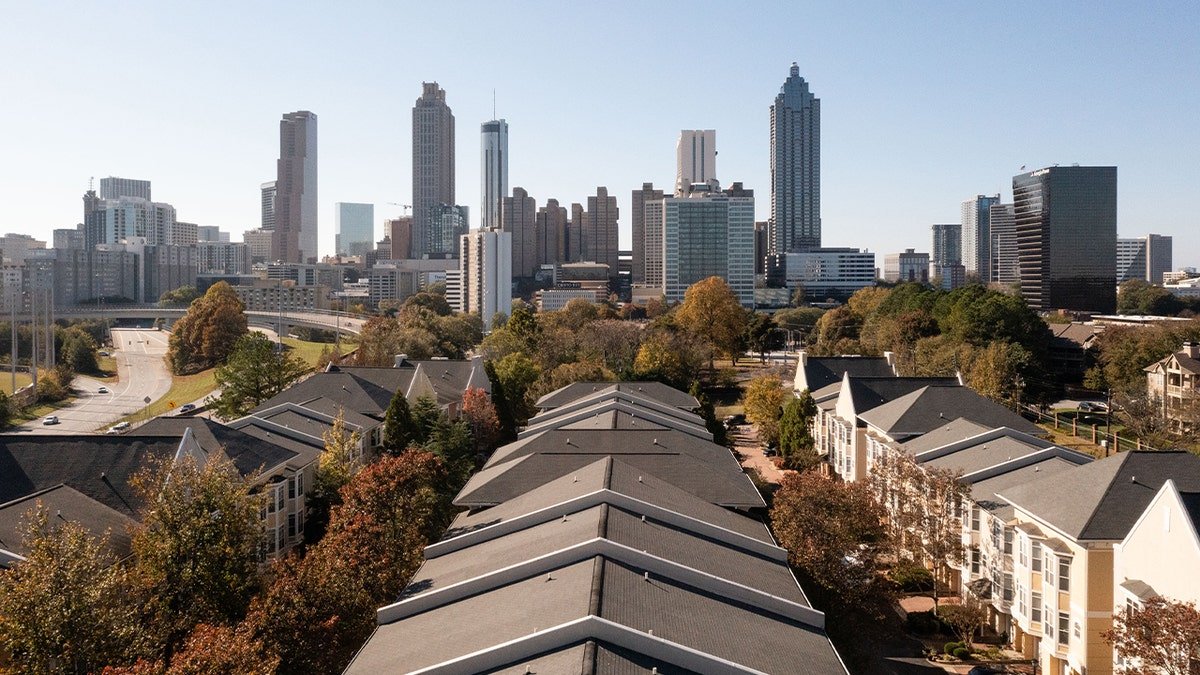 homes in front of atlanta skyline