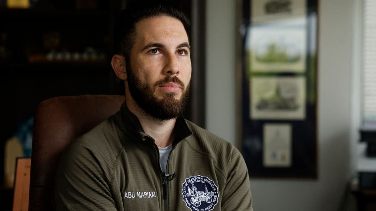 Dearborn Mayor Abdullah H. Hammoud poses for a portrait in his office in Dearborn, Michigan on June 18, 2024. Hammoud's election as the first Muslim mayor of automaking hub Dearborn two years ago was a watershed moment for this city that is home to the highest concentration of Arab-Americans in the United States. But while his early time in office was focused on upgrading the sewage system and investing in parks, he's been thrust into the national spotlight for his outspoken criticism of US President Joe Biden's support for Israel's military offensive in Gaza. (Photo by JEFF KOWALSKY / AFP) (Photo by JEFF KOWALSKY/AFP via Getty Images)