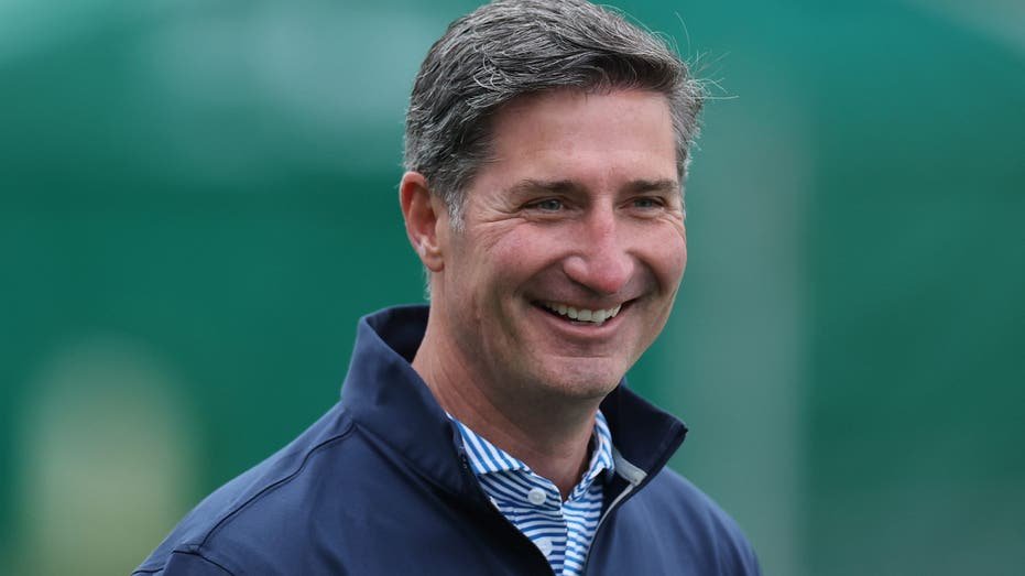 Starbucks CEO Brian Niccol smiling