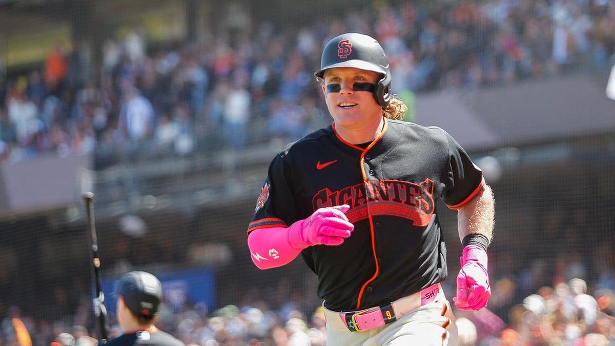 Harrison Bader heads to the dugout after hitting a grand slam at Oracle Park.