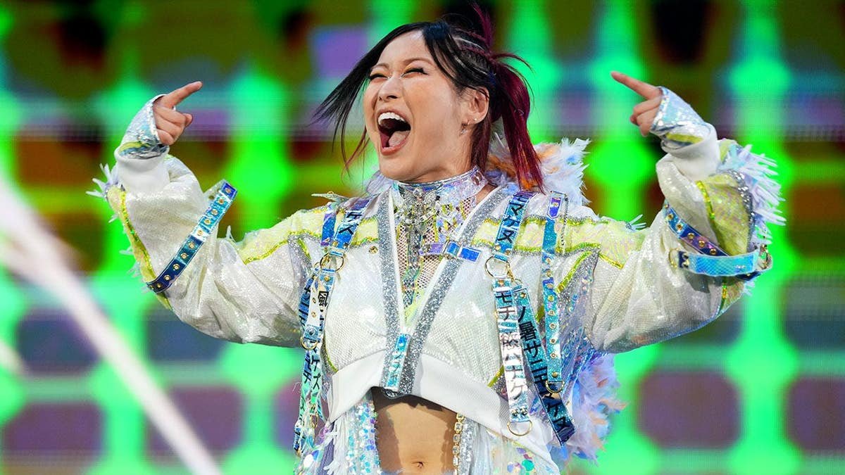 Iyo Sky makes her entrance during Monday Night Raw at American Airlines Center.