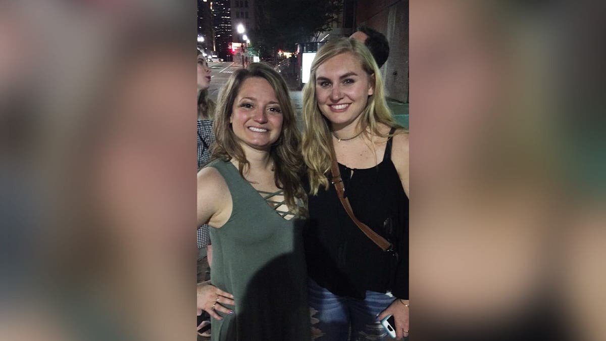 Jennifer Payne and Brooke Hanlon pose for a photo together in Boston.