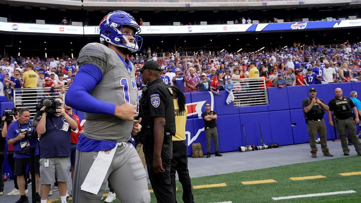 Josh Allen stands at Highmark Stadium during Bills practice in Orchard Park.