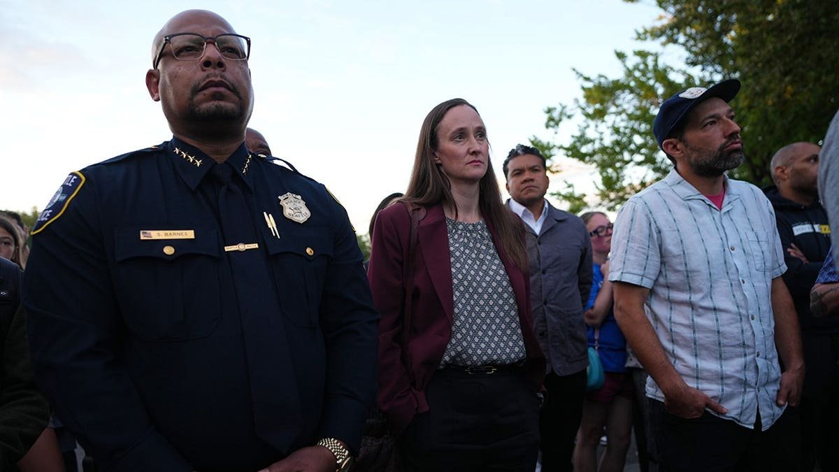 Seattle Mayor Katie Wilson and Police Chief Shon Barnes stand at a vigil in Seattle.