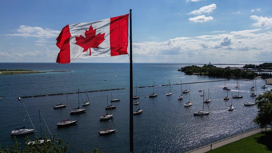 A Canadian flag flies