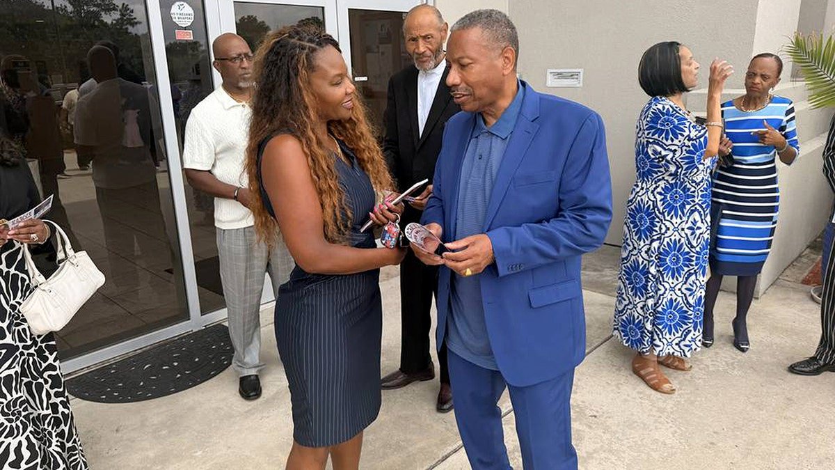 Marcye Scott campaigns with voters