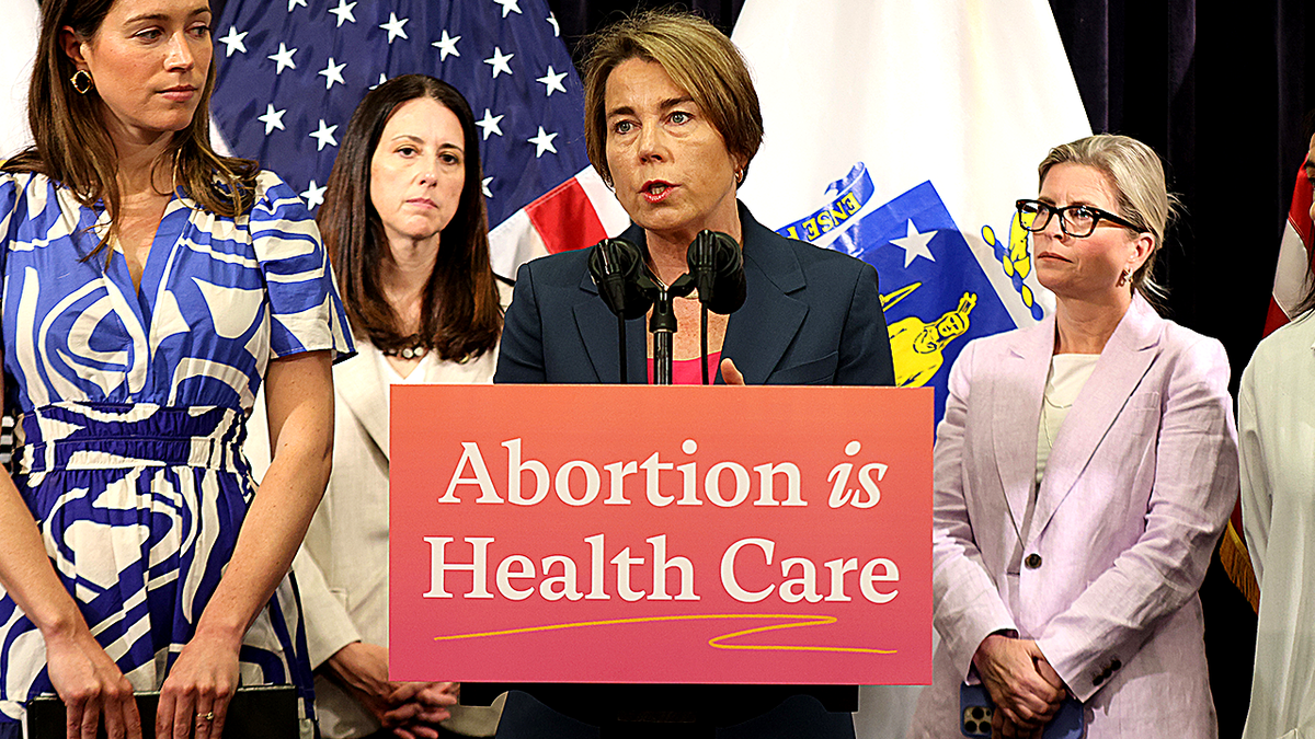 A view of Maura Healey at podium.