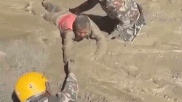 Trapped Nepali workers pulled from hydropower tunnel after catastrophic flooding Trapped Nepali workers pulled from hydropower tunnel after catastrophic flooding