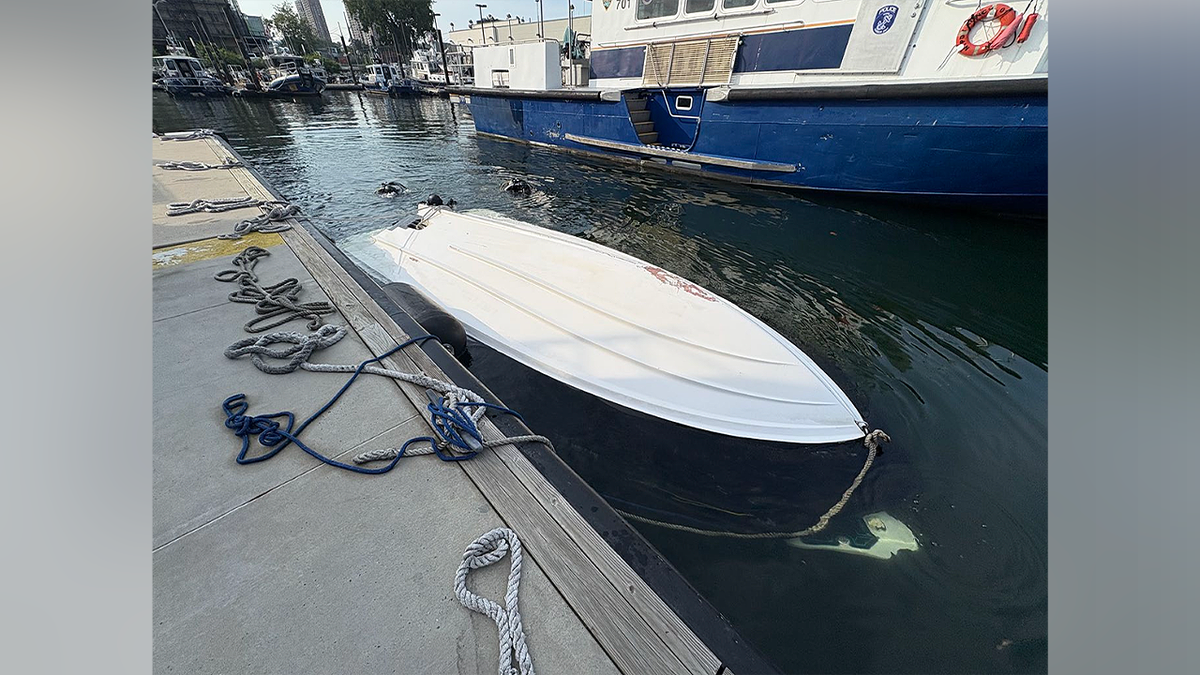 Capsized Yamaha AR210 tied to a pier after the deadly New York Harbor boating accident