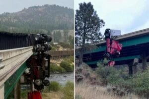 Big rig left dangling from California bridge as driver ejected from truck