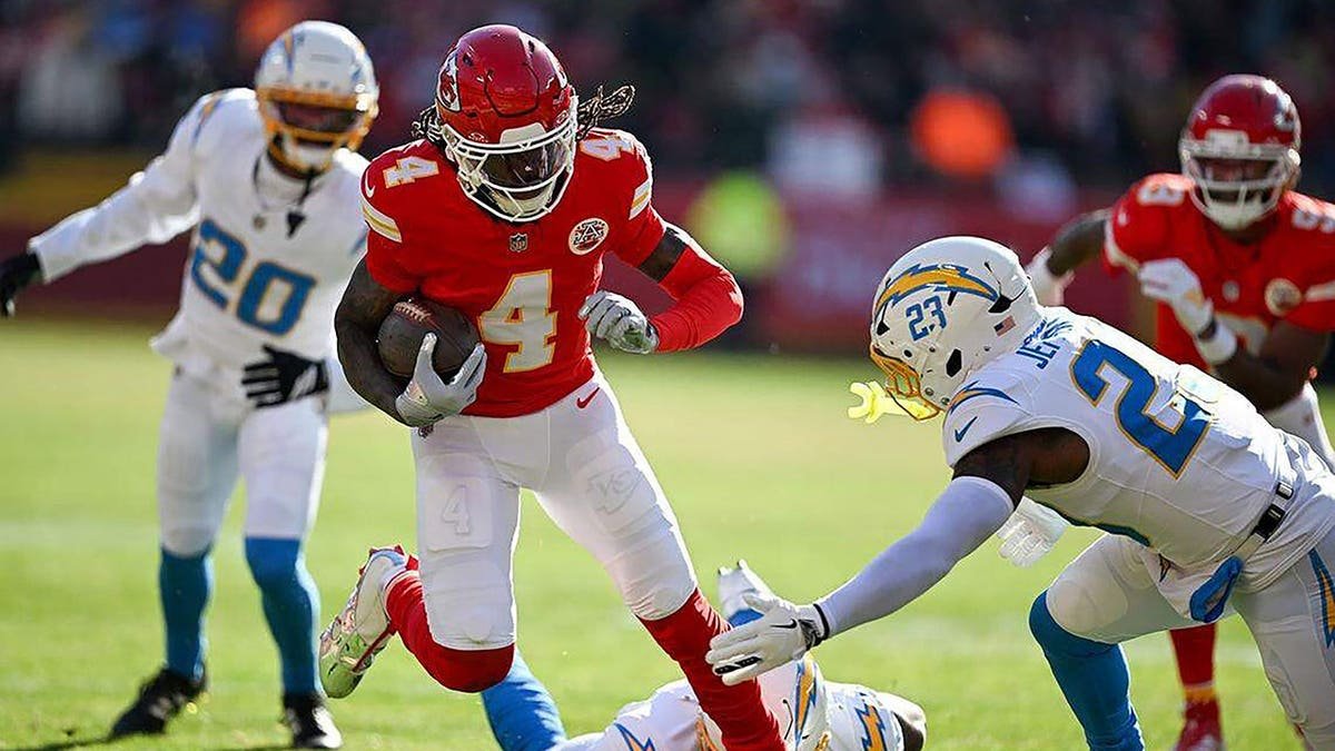 Rashee Rice runs after a catch against the Chargers at Arrowhead Stadium.