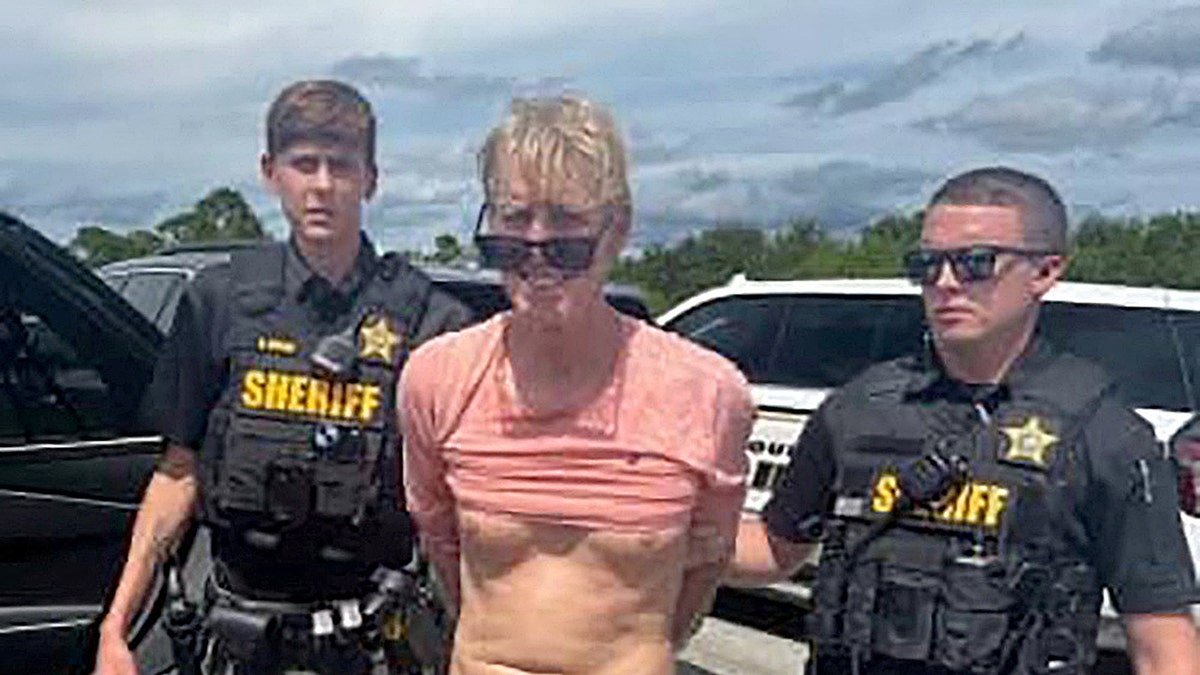 Ryan Routh being detained by officers