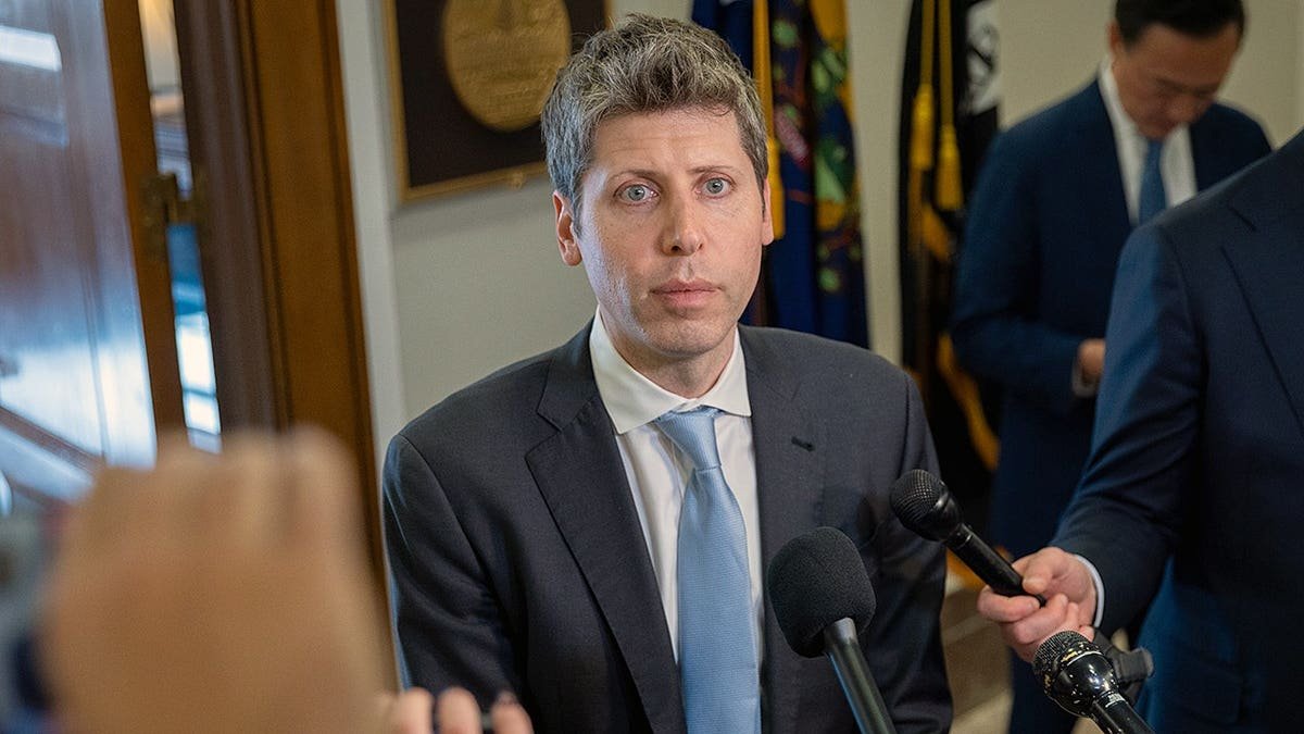 Sam Altman talks to reporters outside the Dirksen Senate Office Building in Washington, D.C.