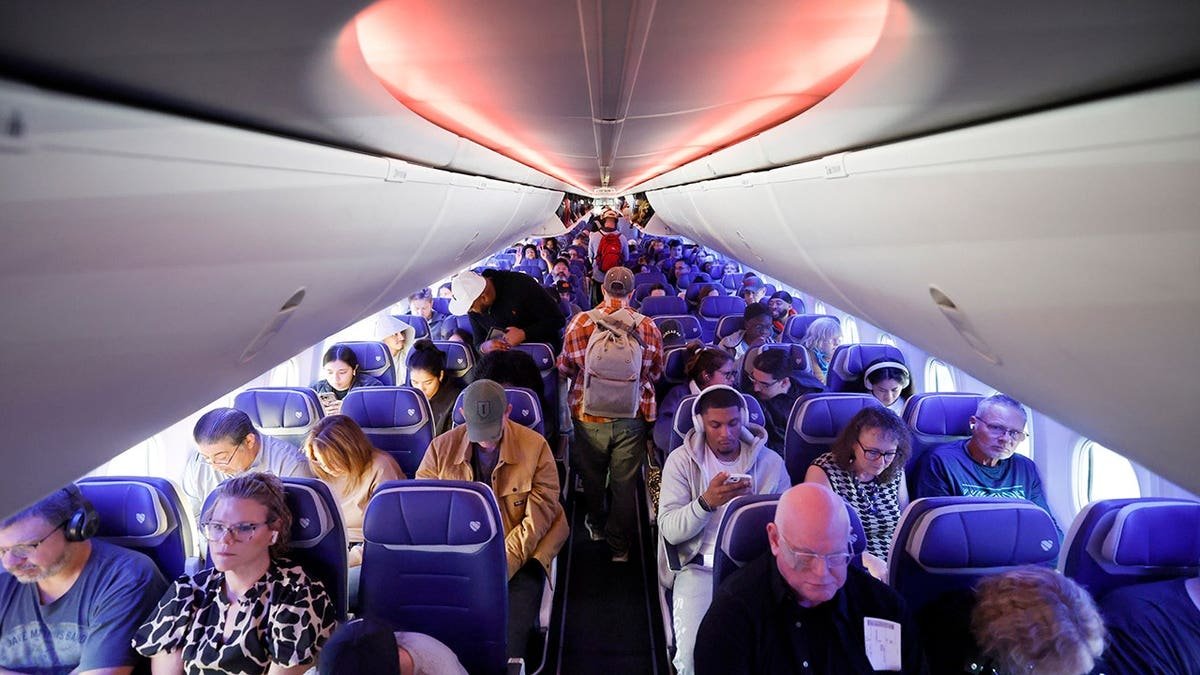 Southwest Airlines passengers settle in for an early nonstop flight from Dallas to Seattle.