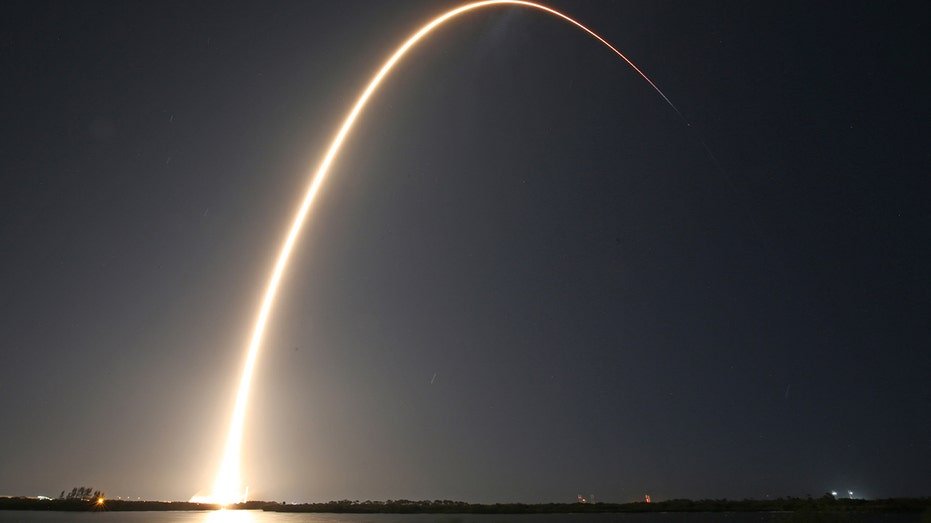 A SpaceX Falcon 9 rocket, carrying Firefly Aerospace's Blue Ghost and ispace's Resilience lunar landers, streaks into orbit after lifting off from Launch Complex 39A at the Kennedy Space Center in Cape Canaveral, Florida, on January 15, 2025.