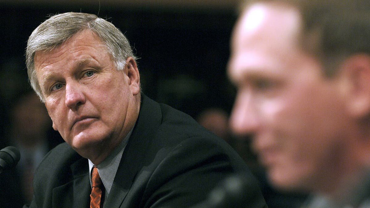 Tommy John, former Major League Baseball pitcher, looks on during Senate testimony in Washington.