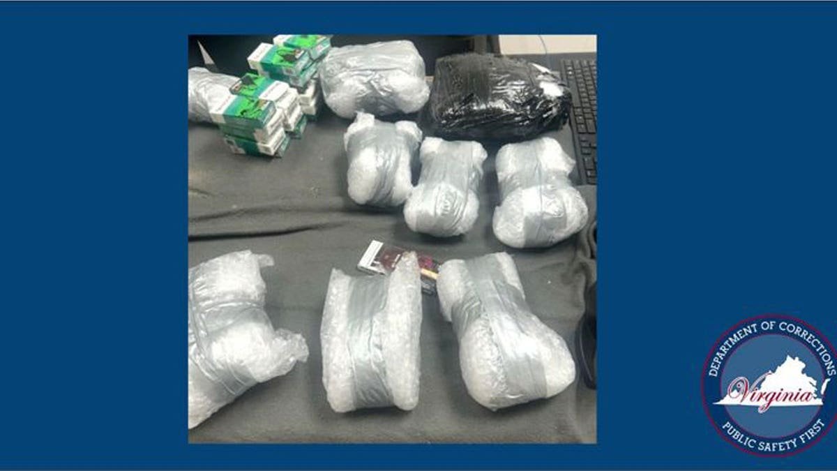 Virginia corrections officials intercepted a package containing a pound of suspected methamphetamine, 17 cellphones and other contraband with an estimated 