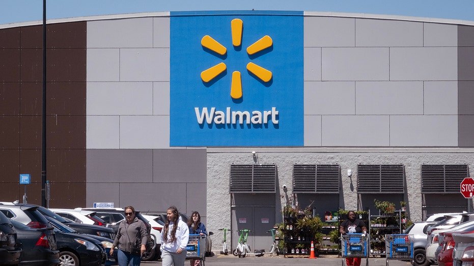 Customers shop at a Walmart store