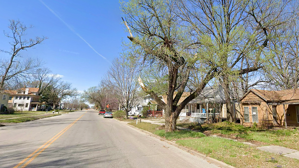 A residential neighborhood in Winfield, Kansas, where police investigated the deaths of a woman and four children in an apparent murder-suicide that left six people dead