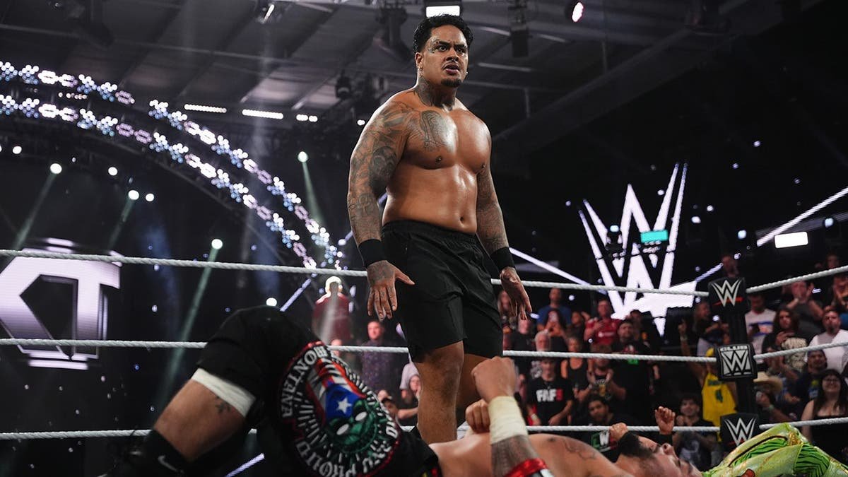 Zilla Fatu stands over Cruz Montana and Grayson Waller during WWE NXT.
