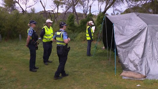 Police and department officers attending Memorial Drive in the City of Rockingham.