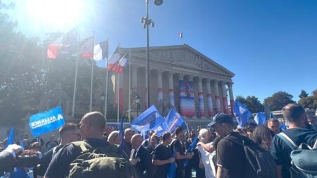 French police take to streets in mass protest over pay, staffing and r